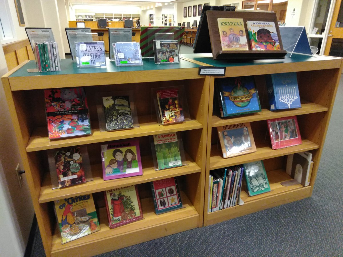 KeeneMasonLib's tweet photo. Our new library display is to celebrate and inform all of our patrons about the various holidays celebrated during the month of December. #HolidaySeason #Kwanzaa #Hannukah #Christmas #Festivus #WinterSolstice #Yule #NewLibraryDisplay #December @KeeneMasonLib @KeeneState_ https://t.co/A2dV7lxojs