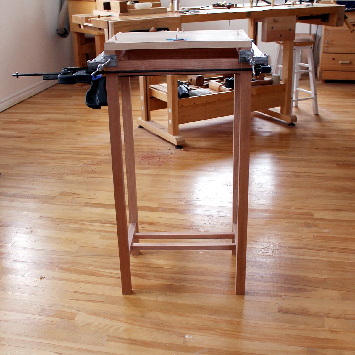 WoodSkills's tweet photo. Stand complete...test fitting to cabinet base. Staggered top rails to delineate front apron, to add decorative inlay to apron. A milestone as all cabinet components  now done #woodworking #woodwork #cabinetbuild #furnituredesign #furniture #joinery #handcrafted @pirollodesign https://t.co/uklHL3qshU