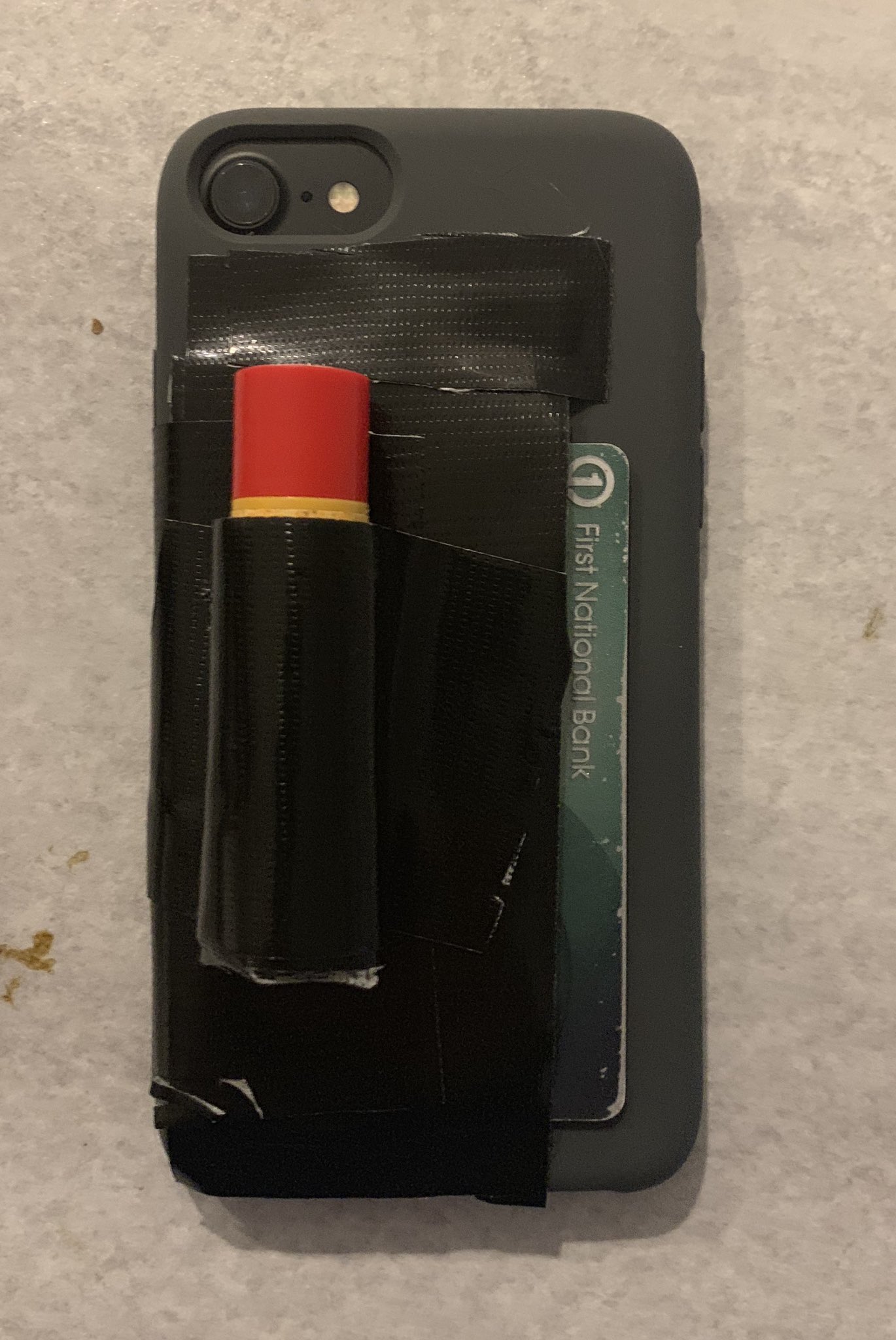 Phone case with shop chapstick holder