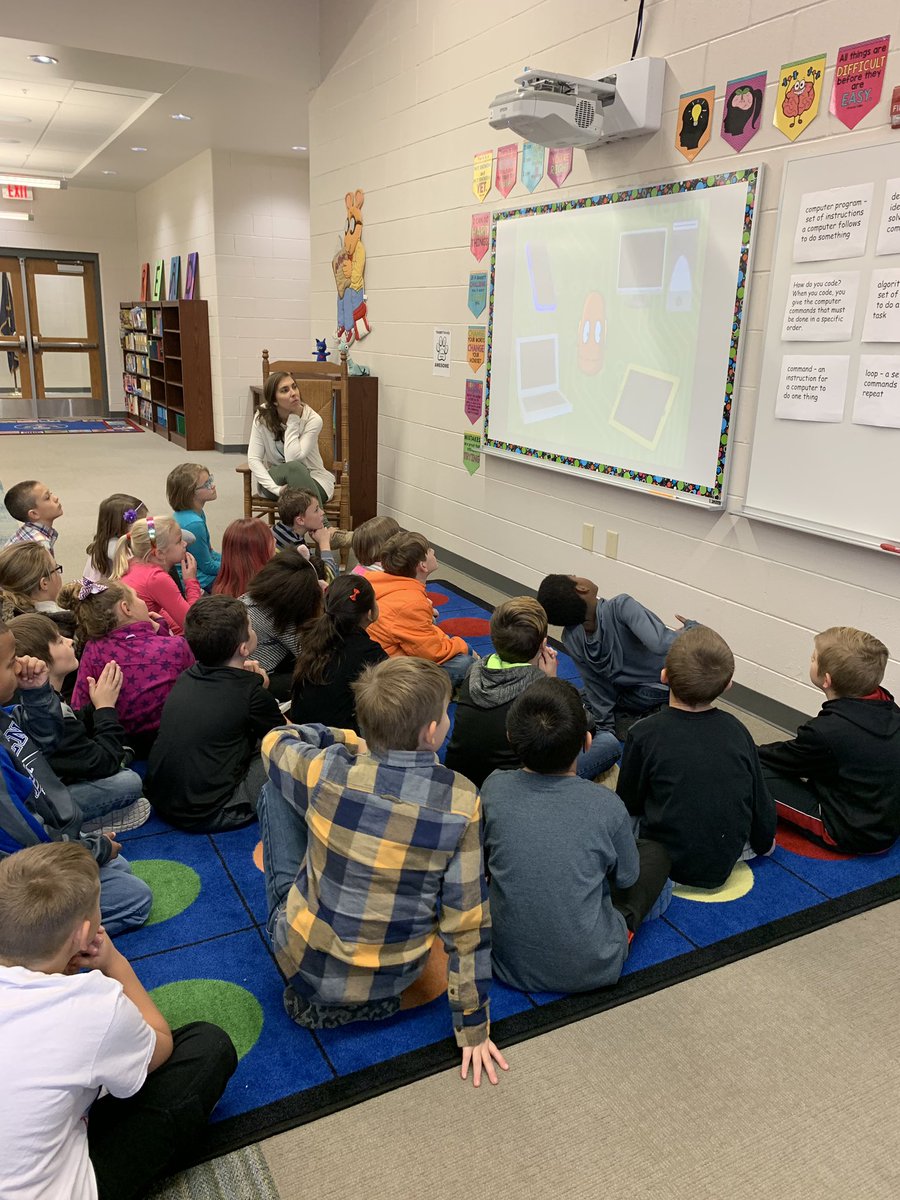 GCBurkhead's tweet photo. The first day of Hour of Code was a success at GCB. Students spent time in the library with Mrs. Skaggs learning about computer programming. They worked on https://t.co/8E8sn7DebG and coded a Mini Sphero through a human obstacle course. #HCSStrongerTogether @HCSTabb https://t.co/ePMRGytt6R