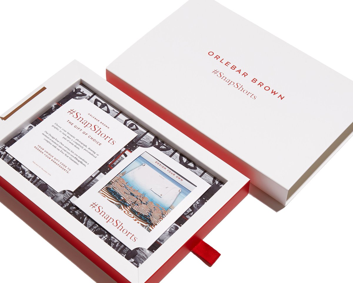 OrlebarBrown's tweet photo. Get creative this year by giving a loved one the thoughtful gift of a #SnapShorts Gift Voucher. Enclosed in a presentation box, the recipient can redeem it against a pair of swim shorts to design themselves. Go in-store or contact obconcierge@orlebarbrown.com to purchase. https://t.co/ZM8LU2Uekf