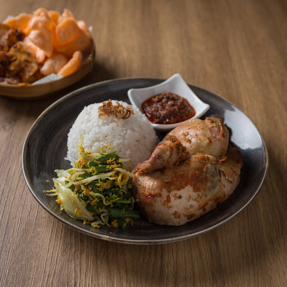 Bursting with flavors, Javanese Chicken showcases the simplicity in cooking chicken with traditional Javanese spices. Available in half and a quarter portion, the dish is complemented with steamed rice, urap, and the best part in any Indonesian cuisine, sambal.