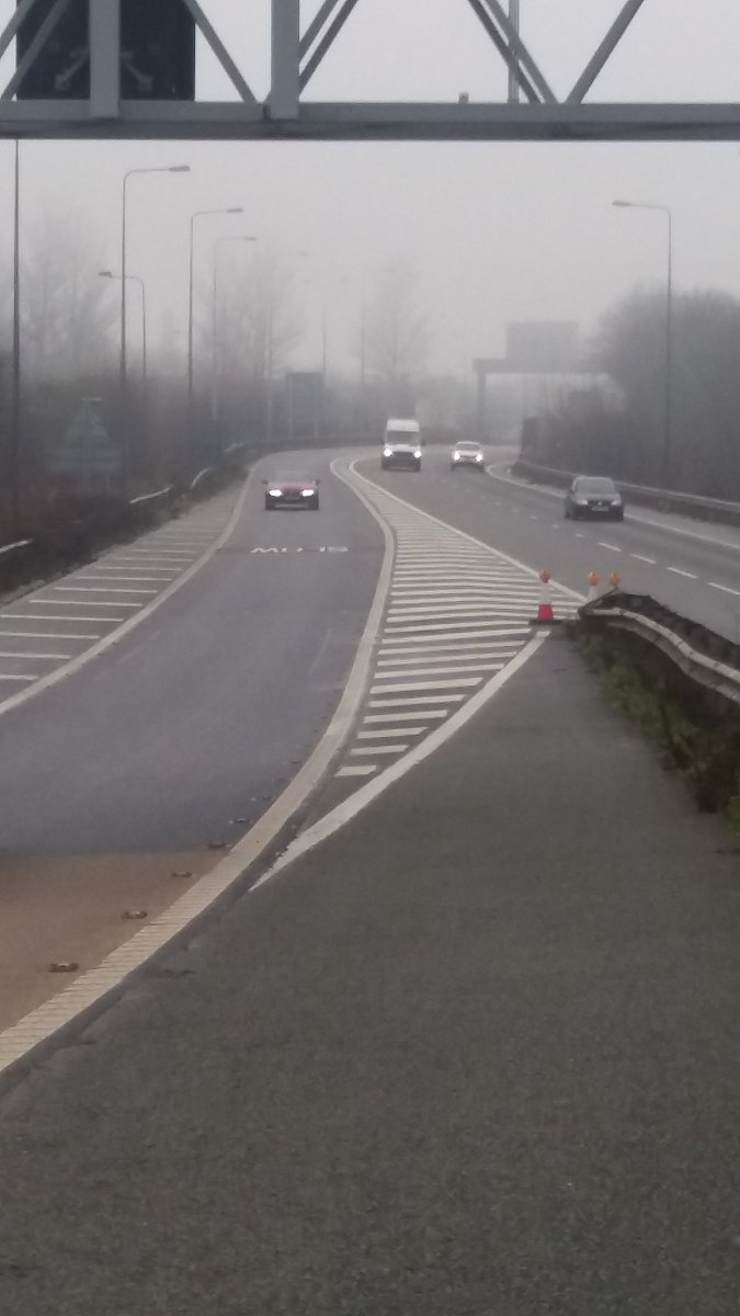 NWmwaypolice's tweet photo. Correction - Any white lines which are solid either on the motorway or on a road you MUST NOT cross. If you do this and the police see you, you may be liable to 3 penalty points on your driving licence and a fine. Following your sat nav will not negate the offence @gmptraffic https://t.co/leIu5CBBab