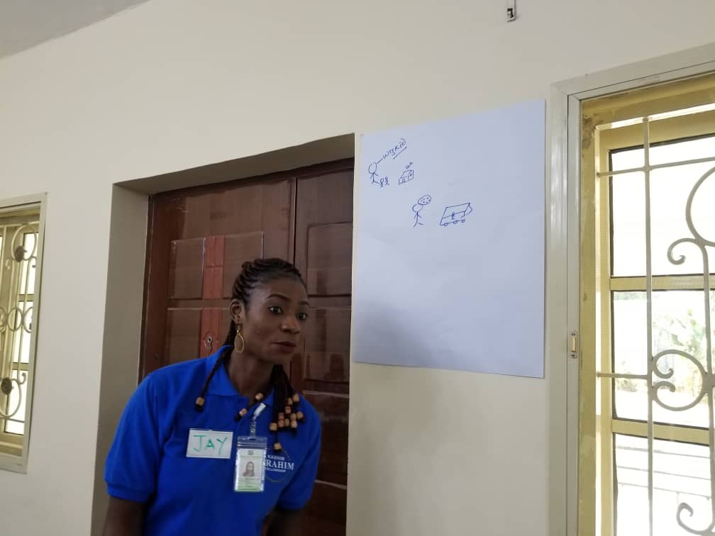 KDSG_KIF's tweet photo. Happening now: Training of volunteer facilitators towards the #KIF4SDGs community service week.
@nikkyjates is taking our volunteers through the interactive lesson plan for SDGs 1 and 2.
#UNChildren #KIF4Kids https://t.co/ex1LbkLgnF