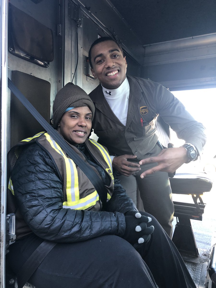 Check out these #peaksmiles on the faces of Grand Rapids West driver, Kevin Haynes and helper Mary. So happy to see this helper team delivering smiles and Christmas cheer to the community. <a href="/Mark_L_Smith/">Mark Lawrence Smith</a> <a href="/UPSGLNORTH/">UPS@GLNORTH</a> <a href="/Gr8LakesUPSers/">Great Lakes UPSers</a>