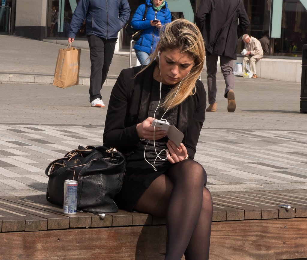 “Candid Blonde Wearing Flats And Opaque Pantyhose Sits With Legs Crossed #s...