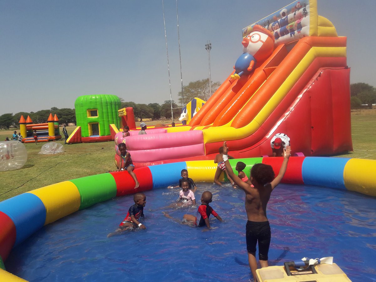 KingsSportsSA's tweet photo. We'll be bringing a super inflatable slide and splash pool to camp next week, to help us cool down in this heat.

There is still time to book - https://t.co/TzSmagei1b 
#Gaborone https://t.co/tT0Y2ZD0AA