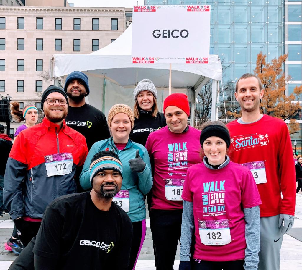 GEICO associates pose for a photo. 