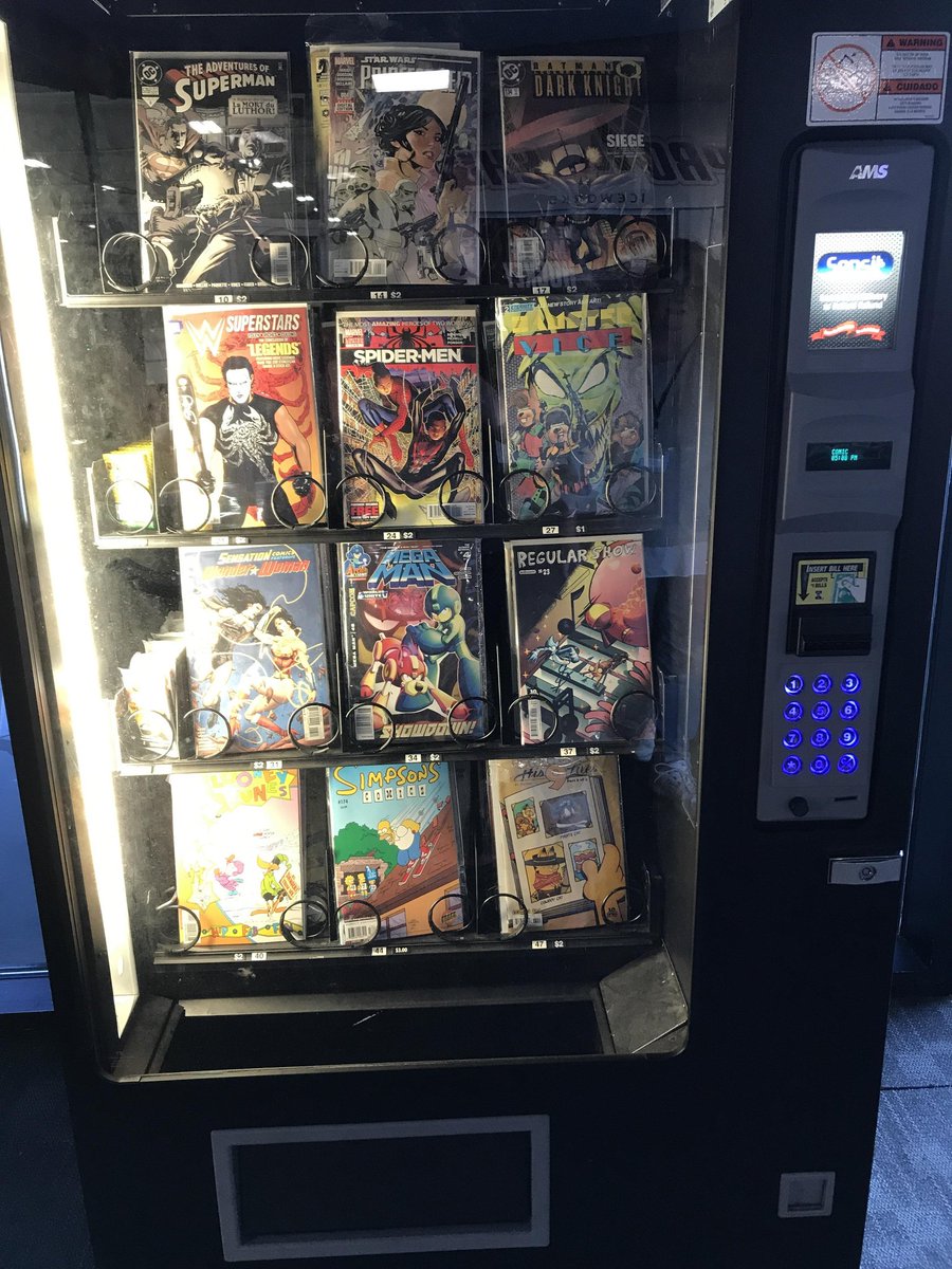 Heyokacomics's tweet image. Comic book vending machines are a thing!