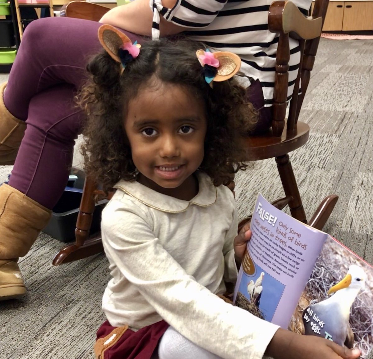 DrJaysonSnyder's tweet photo. This preschool student at Mary Frank was excited about her book! @PHMschools @MFESMustangs #PHMExcellence https://t.co/xfvZAxnVZE