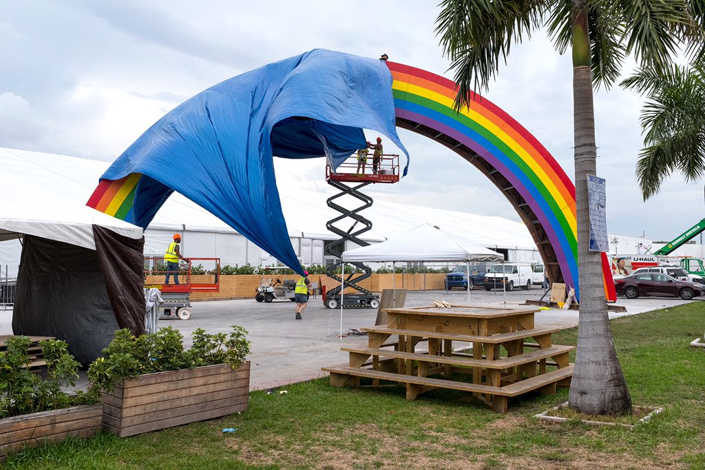 NickTurpin's tweet photo. You know when you’re wandering and not much is happening...and then some men try to cover a rainbow with a tarpaulin in the wind...and you’re like, that’s what I’ve been waiting for and run 150 meters in under 3 seconds. #knowitwhenyouseeit #canpubphoto https://t.co/T4aBomyUpl