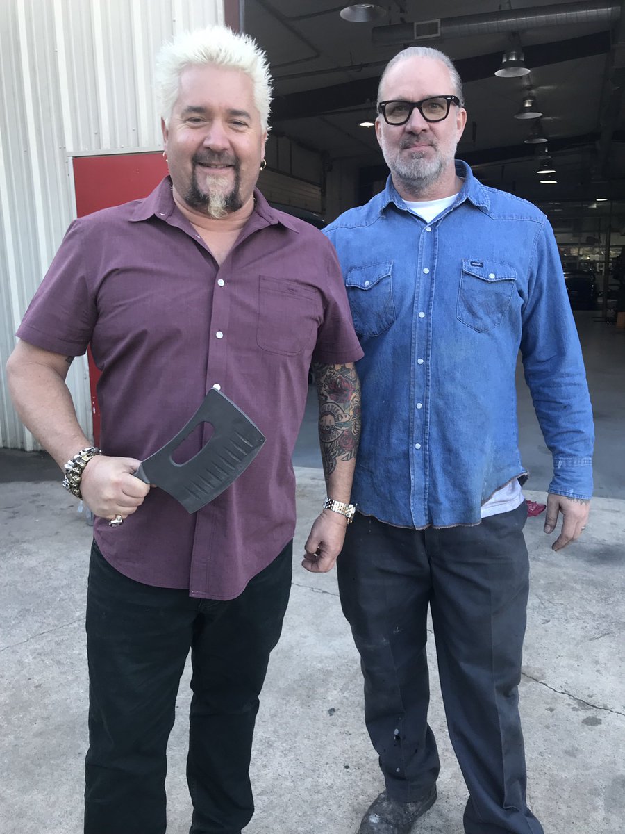 GuyFieri's tweet photo. In Austin for #DDD. Stopped by Jesse James shop. Dude is building it all. Wow. The knives are money! @popeofwelding https://t.co/9rC89XF8AR