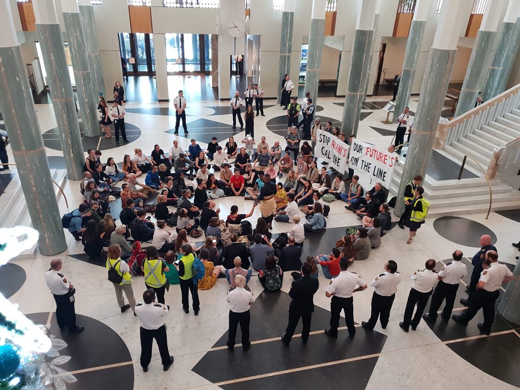 Holding space in Parliament House to stand up for our future and climate justice. We are calling on all politicians to #StopAdani, end all new coal and gas and get us to 100% RE. This is what democracy looks like. #FightForOurFuture #ClimateStrike