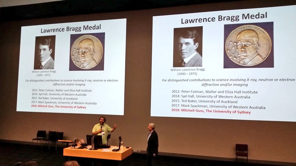 garagao's tweet photo. Prof Mitchell Guss is awarded the #SCANZ Bragg medal for a distinguished career with numerous contributions to #crystallography and mentorship that helped many of today's leaders #bragg #AsCAnz #crystal32 #MAD #restrainrefinement #plastocyanin #anomalous #biosaxs #iucr @IUCr https://t.co/7O97dbDU6H