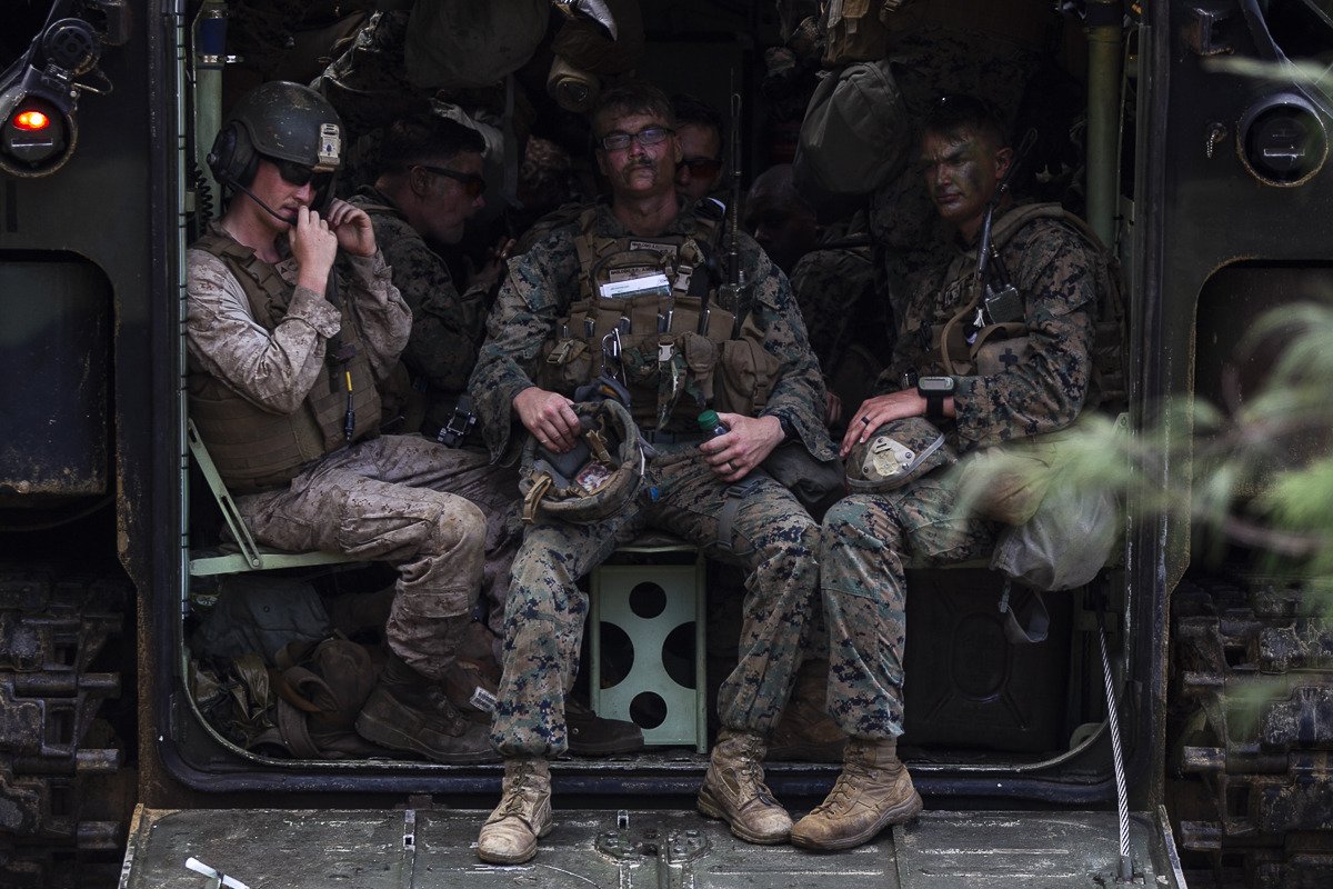OKINAWA, Japan - #Marines with Echo Company, Battalion Landing Team, 2nd Battalion, #5thMarines, take a short breakduring a mechanized assault as part of the 31st Marine Expeditionary Unit’s MEU Exercise, near Ginoza Village, Okinawa, Japan, June 28, 2018.