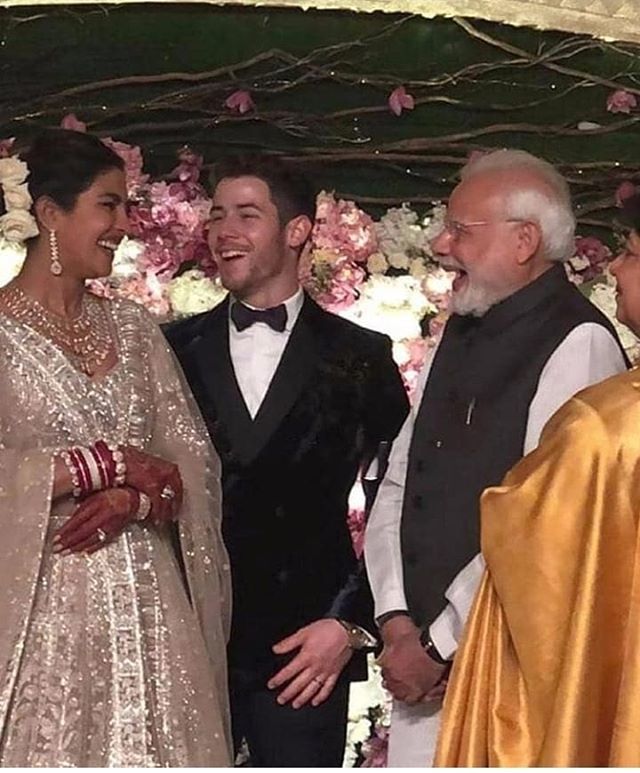 mcndigital's tweet photo. Prime minister @narendramodi at piyankachopra'sr reception 
For more follow @mcndigital

#priyankachopra #priyankchopramarriage #pc #narendramodi #pm #primeminister #nickjonas #instagood #bollywood #cinema #picoftheday https://t.co/0cDxRgxEJ9 https://t.co/OSiWZbfbyc
