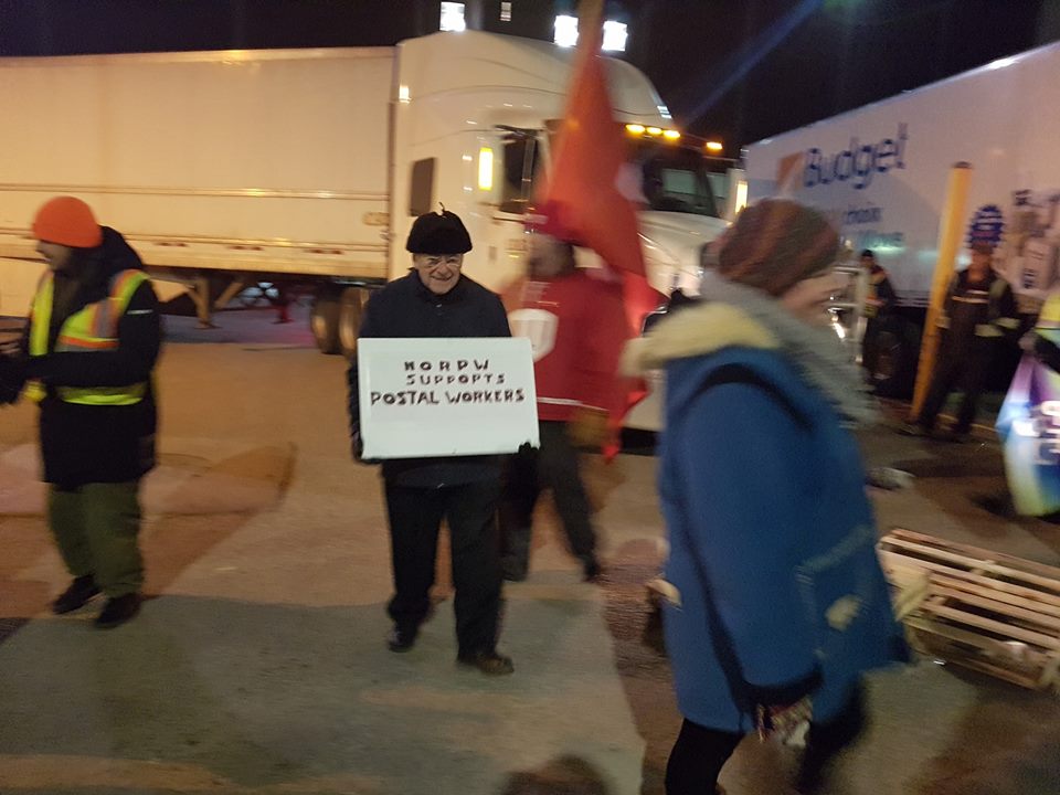 JohnClke's tweet photo. Almost forty years ago JC Parrot went to jail because he didn't think governments should tell #workers to take down their picket lines. Here he is in #Ottawa today at a #postalworker #solidarity action showing the lesson was wasted on him #peopleforposties https://t.co/ce780hWZNm