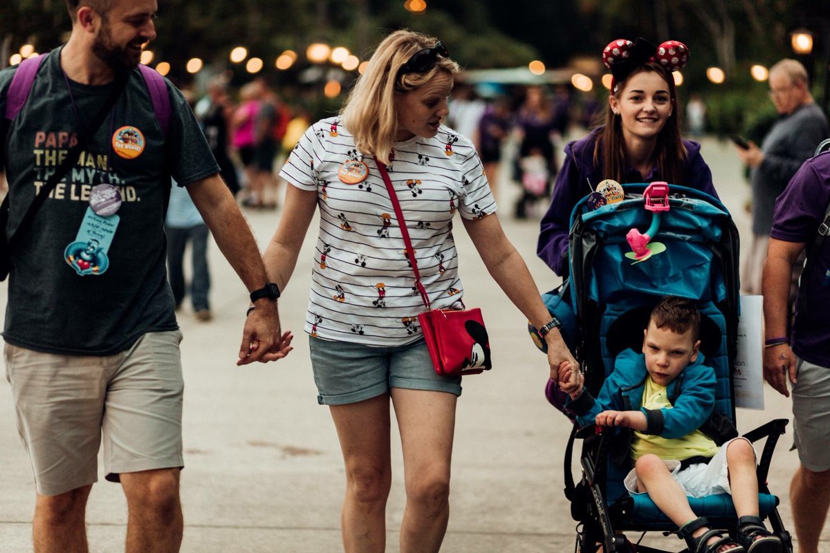 trudibeswick's tweet photo. A volunteer selflessly spending her valuable time pushing a wheelchair so a family can hold hands, see the smiles on each other’s faces and enjoy time as a family creating memories. A huge thank you to all the #DestinationDreams #volunteer team! Go to @caudwellkids for updates💜 https://t.co/ENcpMwwcWh