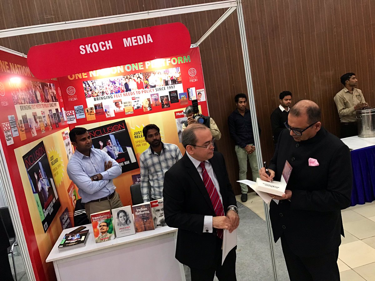skochgroup's tweet image. At the summit sidelines, @SkochSameer signs his book ‘Indian Reforms’ for Hemant Dabke, VP Strategic Industries, @SAPIndia during 54th #SkochSummit on Power, Oil and Gas. @DhanjalDr @RohanSkoch @SAPIndia @SAP #indianreforms #SkochAward
