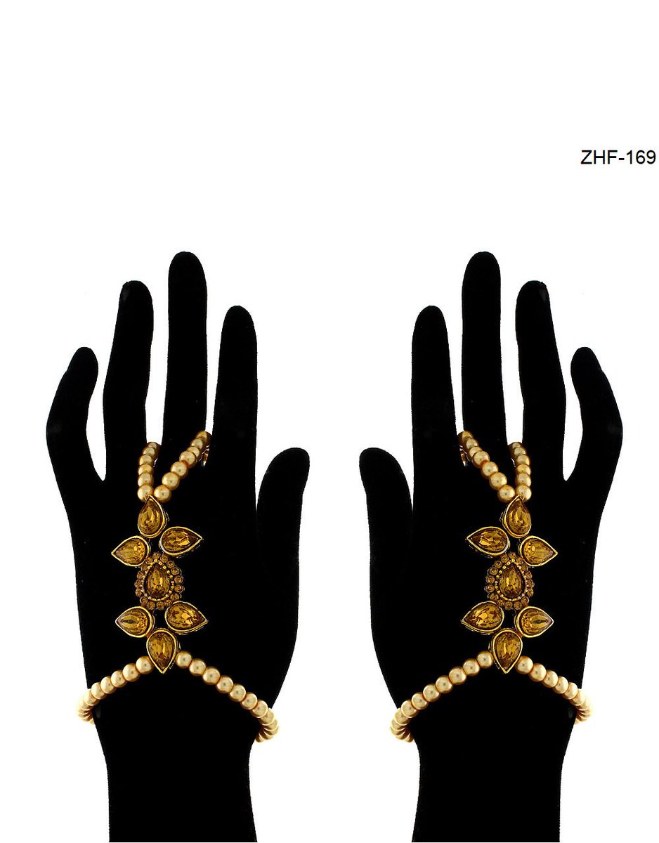 Anuradha Art Jewellery offers beautiful range of stunning hand jewellery for Indian brides on mehndi function during wedding. To get more designs in hand harness or hath phool click on this link bit.ly/2zlZhl8
#hathphool #ringwithbracelet 
#braceletwithring