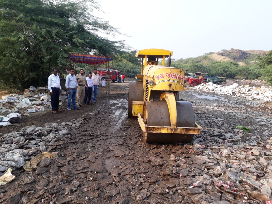 Indian Made Foreign liquor 2.56 lakhs Bottles worth 2.88 Crores seized under 897 offences were destroyed today at Jambudi Taluka Halol as per the Directions of Judiciary. <a href="/CollectorGodhra/">Collector Panchmahal</a> <a href="/pkumarias/">Pankaj Kumar</a>