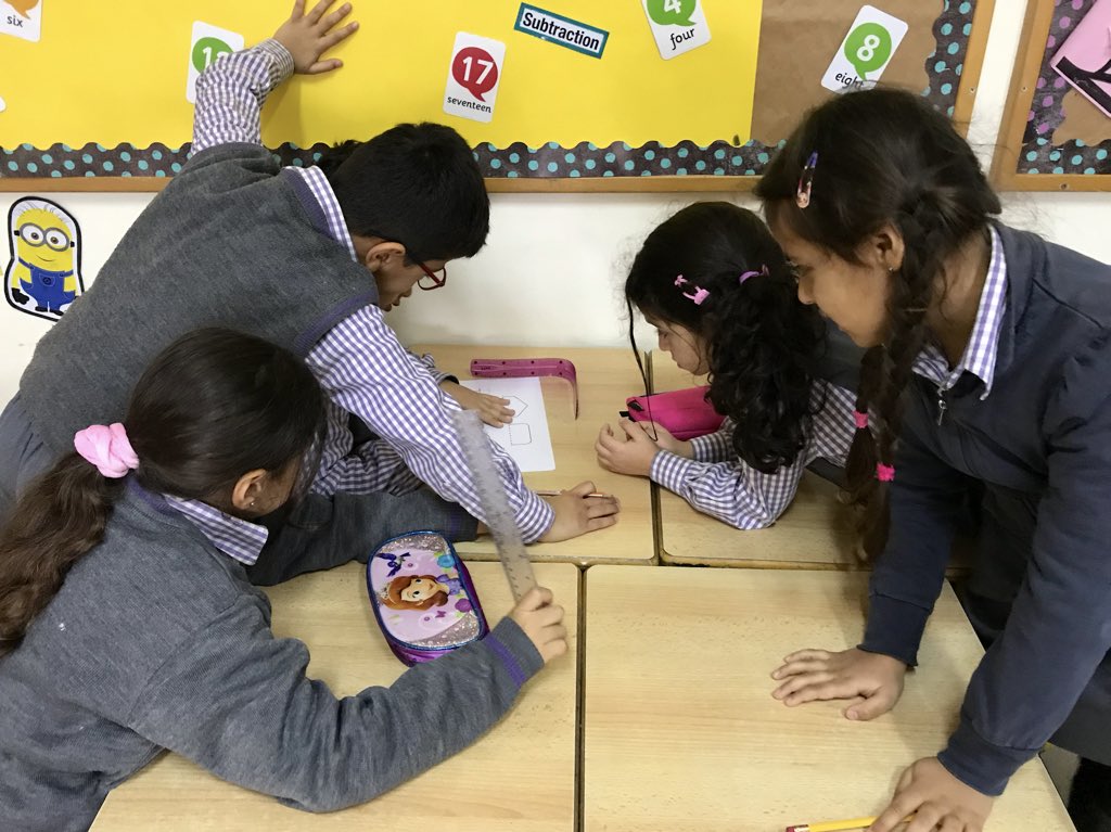 KobrosliFarah's tweet photo. Second graders drawing in teams the lines of symmetry of the items/ shapes handed to them. #TeamworkMakesTheDreamWork #DifferentiatedActivity #AccordingToLevels #SymmetricalShapes #WeLoveMath @DawhaHighSchool https://t.co/JFwOy3WzTy
