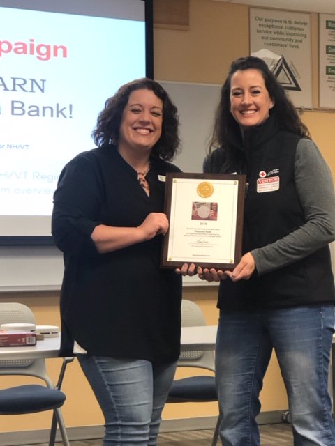 Showing appreciation to <a href="/MascomaBank/">Mascoma Bank</a>  for raising awareness about <a href="/RedCross/">American Red Cross</a>  Home Fire Campaign in bank branches throughout NH &amp; VT. Plaque presented to Mascoma's Nicole Affeldt by Stephanie Couturier of Red Cross of NH &amp; VT. Thank you for your support!