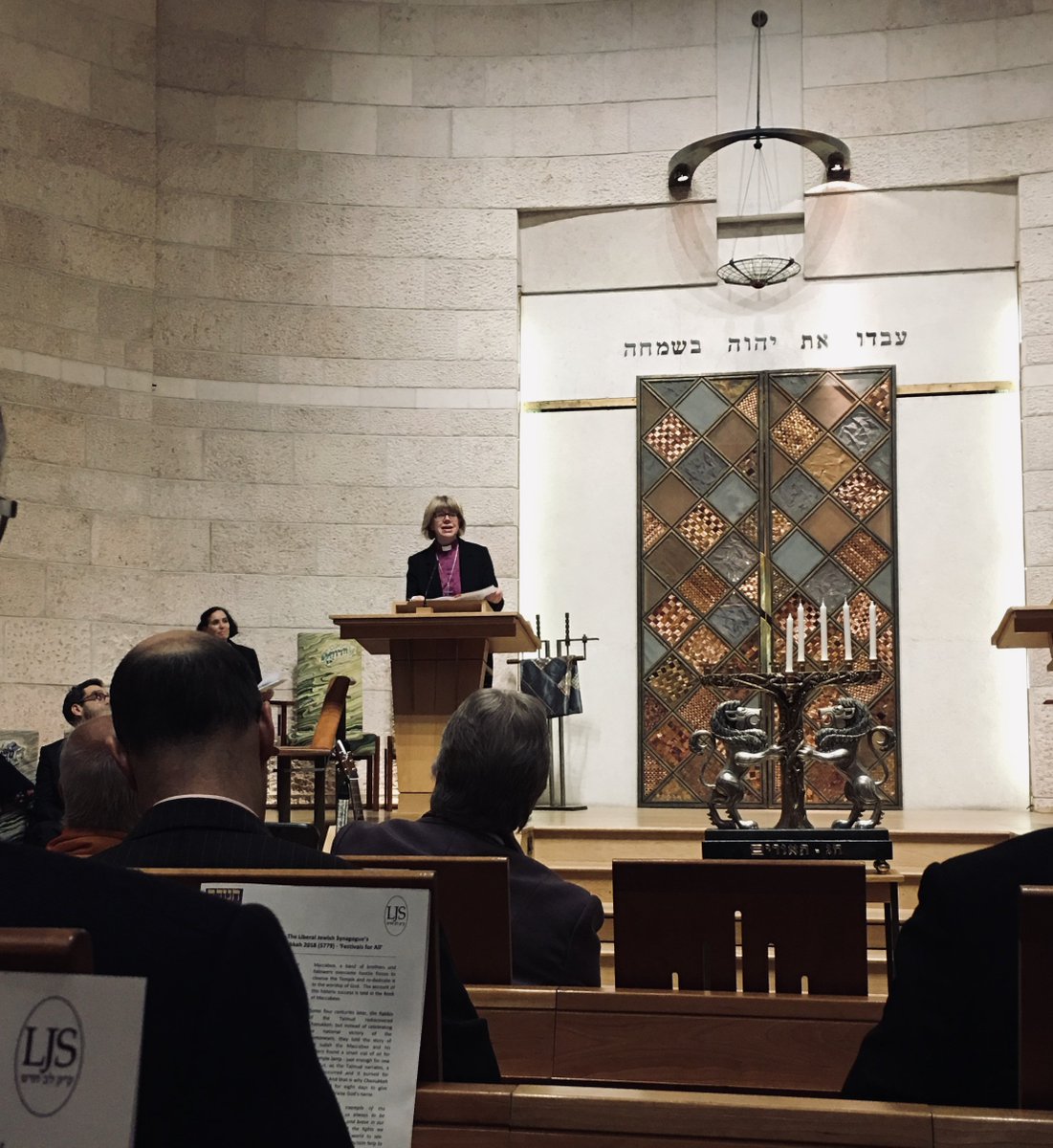 spmarylebone's tweet photo. A warm welcome from friends @The_LJS for the Chanukkah #FestivalsforAll Words of hope & light from @bishopSarahM, four candles lit, psalms sung, latkes & doughnuts for all! My little one made a card to say #thankyou #interfaith @nearneighbours @dioceseoflondon @churchofengland https://t.co/nAFt9gMnaD