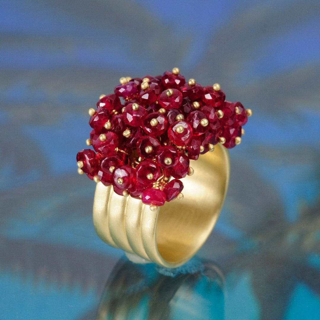 meandrojewelry's tweet photo. Ruby has been the stone of royals for centuries, signifying protection and passion. Dozens of faceted ruby beads sway freely on this vibrant band of recycled 18k gold. #ruby #bead #ring #vibrant #redberries #royalstone #18kgold #madeinnyc #meandrojewelry https://t.co/BqwhbkAS8i