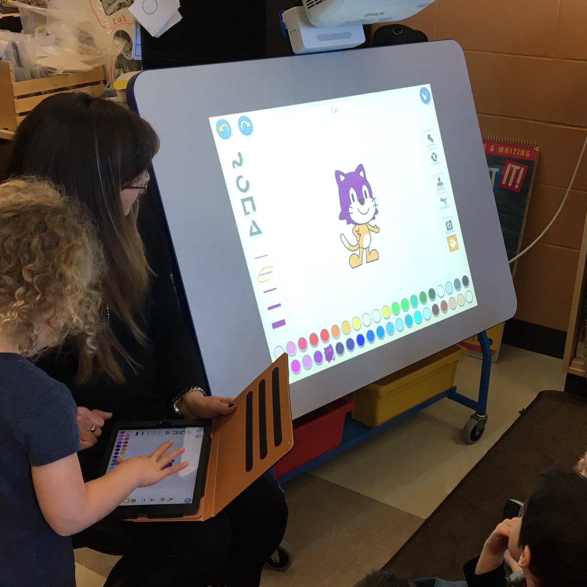 SarahJackett2's tweet photo. Students teaching other students what they have discovered while coding. Everyone is a teacher!#WEcode#ontariocodes #@GoHurricanesGo#tllp https://t.co/IIAuPXD0VP
