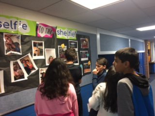 MsFlynnD53's tweet photo. Match the Selfie to the Shelfie!  @D53ButlerJHS readers are always up for a good game.  Use #visualliteracy skills, distinguish between important +interesting, #infer, think flexibly, #persist, + have fun!  Thx Ts + @busterbringsjoy for 📸📚+🤳#D53learns #D53reads #elachat https://t.co/82drD94huV