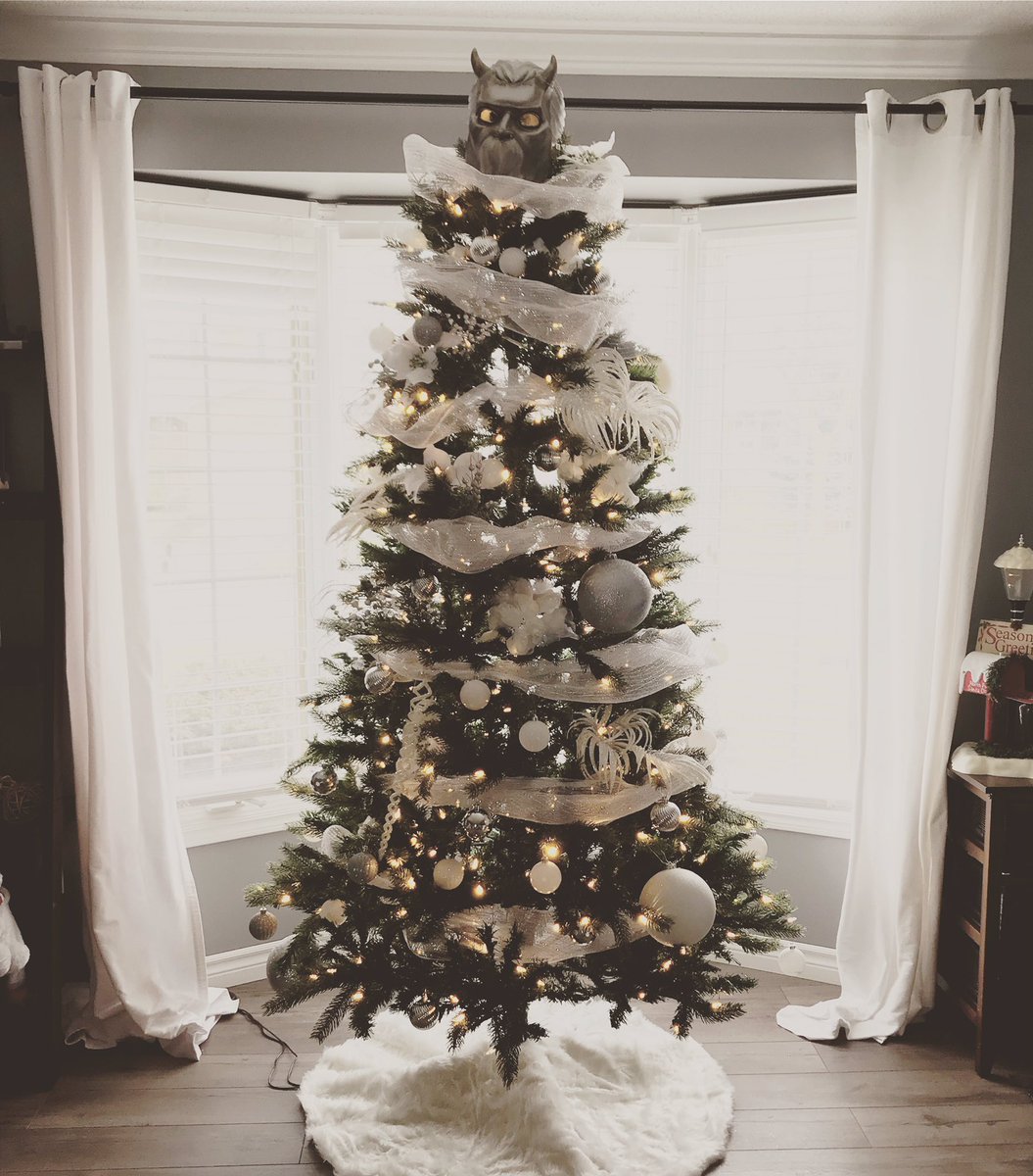 Krizzta's tweet photo. @SisterImperator Here is our tree, Sister.  Do you like our tree topper? https://t.co/Edv0kUI7KR