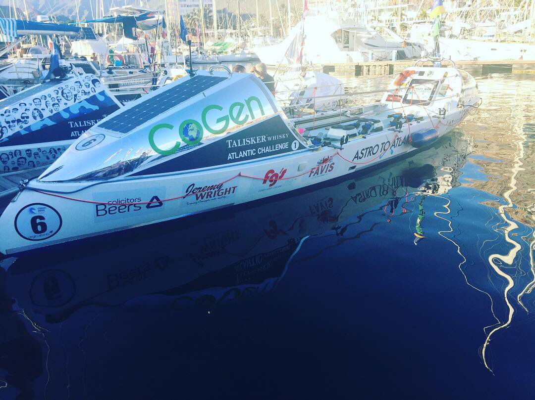 astrotoatlantic's tweet photo. Huntress is in the water!💙She is looking fab in the La Gomera sunshine - can’t wait to get out training. Thanks OHJAY Creative &amp; Future Client for all your superb graphics😍It’s been 18 months of prep to get here - thank you to our amazing sponsors for being part of our journey. https://t.co/Qo5Xqjr09e