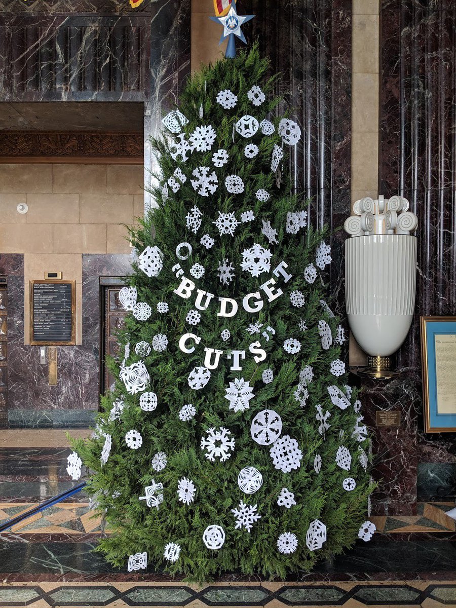 The Division of Administration tree recycles old copies of the executive budget into almost 200 unique snowflakes. Stop by Memorial Hall in the Capitol for a closer look!