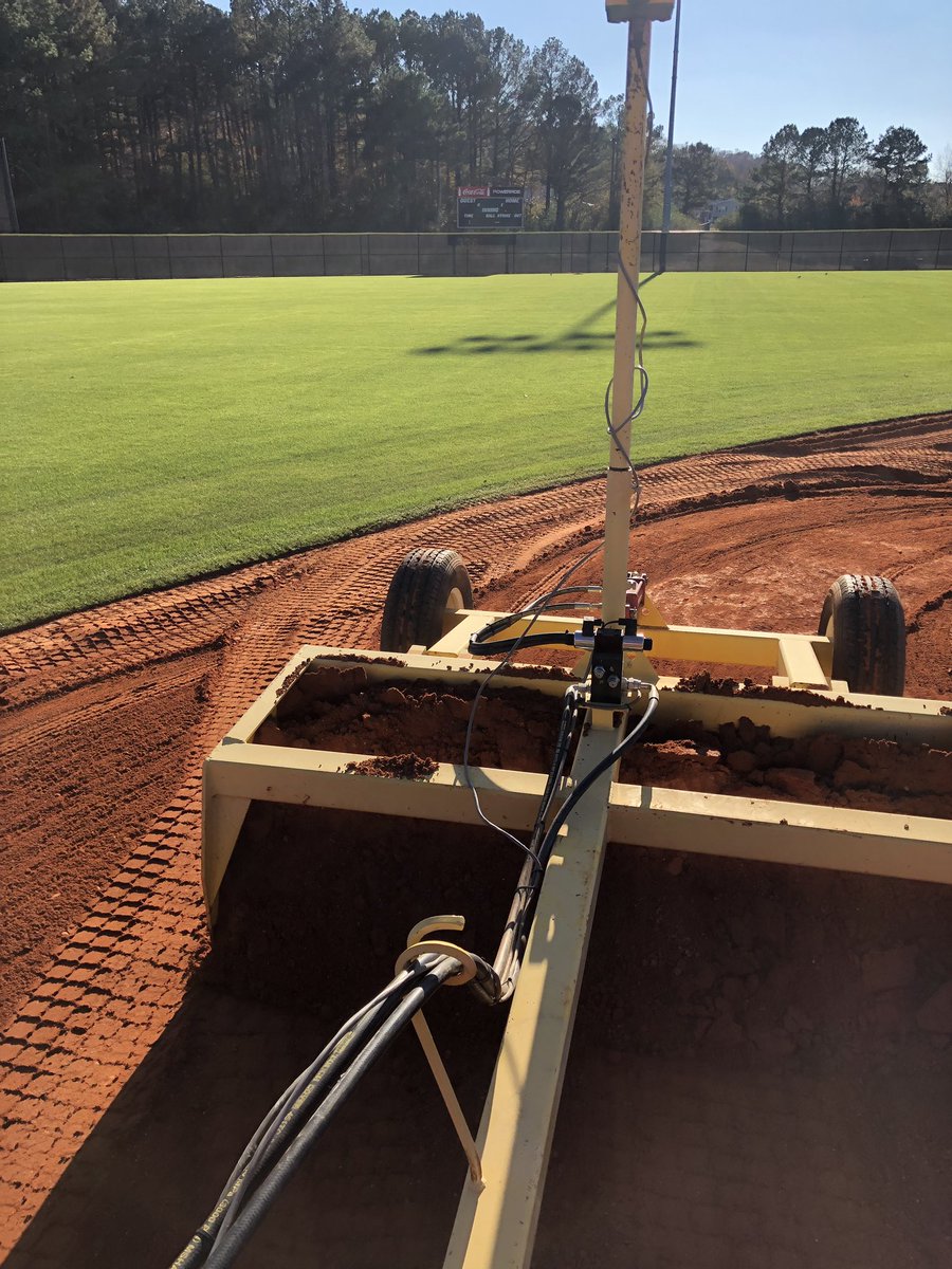 TJFoley84's tweet photo. The guys @jdanelutt21 @loganwatson2015 leveling out the baselines while I do my best @D_Ruggiero83 impersonation and touch up the infield grade. https://t.co/xBlYTuih3o