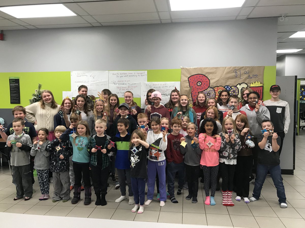 Grade8JDH's tweet photo. Supporting the grade 2s from @StuartBakerES at @JDHodgsonES with their art projects today #tldsblearns @GervzMike https://t.co/MLefpR2gwU