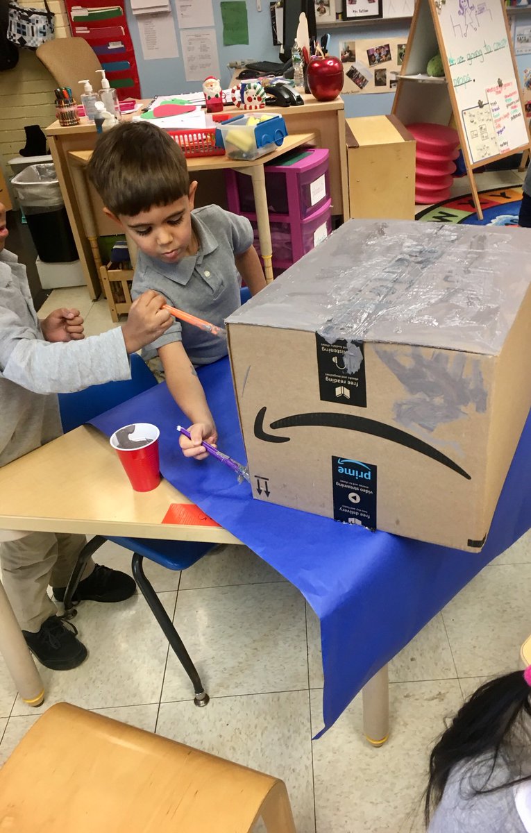 Jessica81795091's tweet photo. True-to-life ATM machine, found in our classroom grocery store. Play money, credit cards, number dial and receipts all serve a great way to introduce math concepts in a fun way. #cardboard bottle tops,numbers, labels.I❤️prop making.#studentpaint📦💳💵@jen_rettino https://t.co/Z2DAYVZTl7