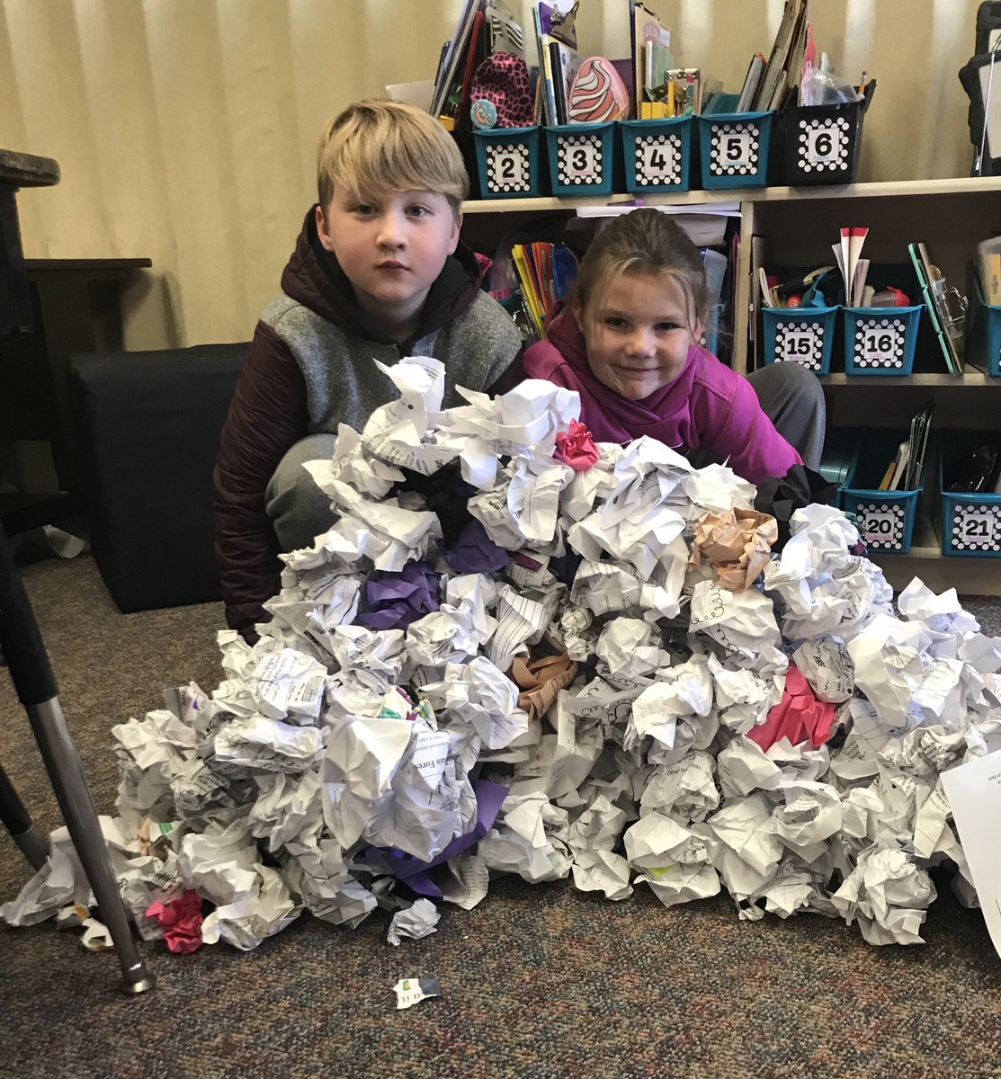 CariLillquist's tweet photo. A little recycling collecting from other classrooms makes good for building a “snowball wall” #organizedchaos #teamwork https://t.co/6SpHS19Ah6