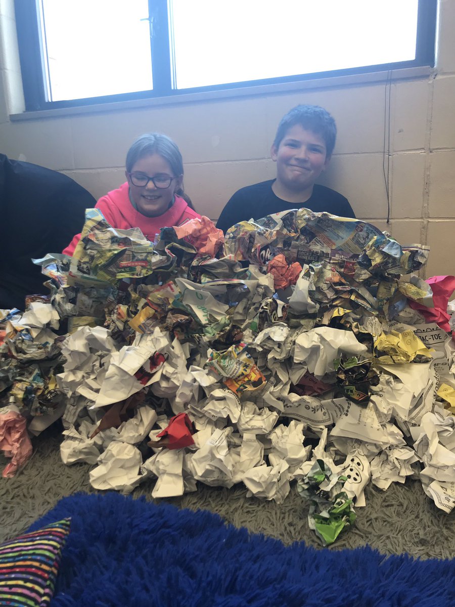 CariLillquist's tweet photo. A little recycling collecting from other classrooms makes good for building a “snowball wall” #organizedchaos #teamwork https://t.co/6SpHS19Ah6
