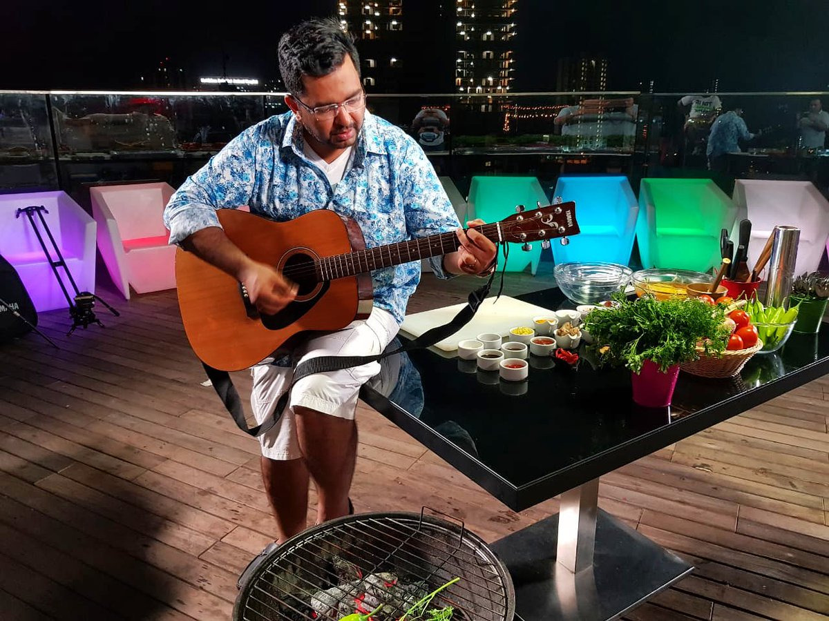 mchefajaychopra's tweet photo. Apart from cooking, playing guitar is something that makes me happy. It is important to look out for those moments in life that bring you joy. Tell me what brings you happiness in the comment section below. #ThrowbackThursday #ChefAjayChopra #Guitar #joy #happiness #BigDaddyChef https://t.co/QSTSwoP7Al