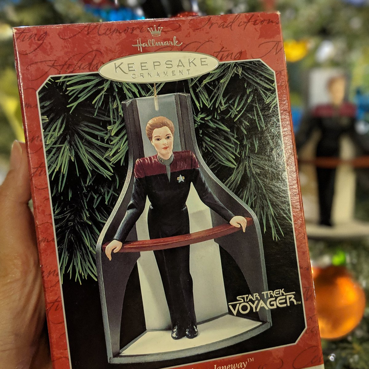 alachia's tweet photo. When we were visiting my parents during Thanksgiving, @azyxa found this used Captain Janeway Hallmark ornament for me in a comic book shop. So excited to hang it on the tree! #bestfindever #whowouldgetridofthisgem #mywin #startrek #voyager #captainjaneway https://t.co/U8S7qqeJa7