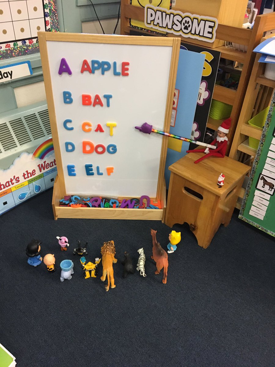 Our classroom elf is having some ELA fun!!