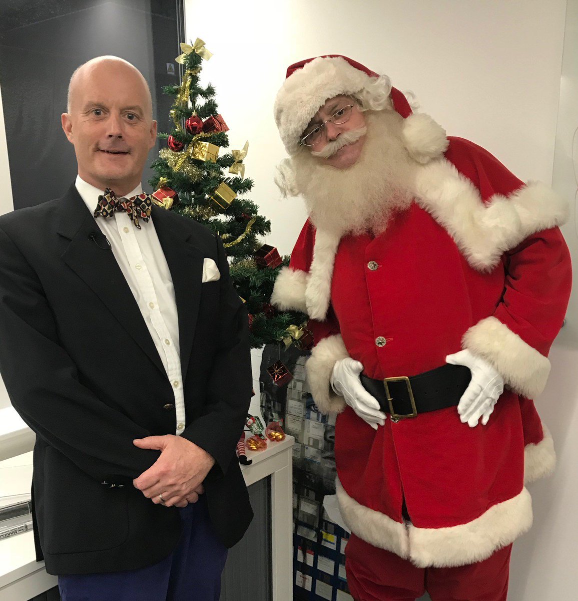 BEDAVIDSAUL's tweet photo. #ThrowbackThursday spotted James Lovell @bellowsthefool on #TheApprentice last night doing his #Santa training &amp; remembered when he came in to @BEoffices last year to train our directors for our #BeMoreSanta day in aid of @RaysofSunshine @ministryoffun1 @Mark_E_Wright #Christmas https://t.co/Ca26XvKi64