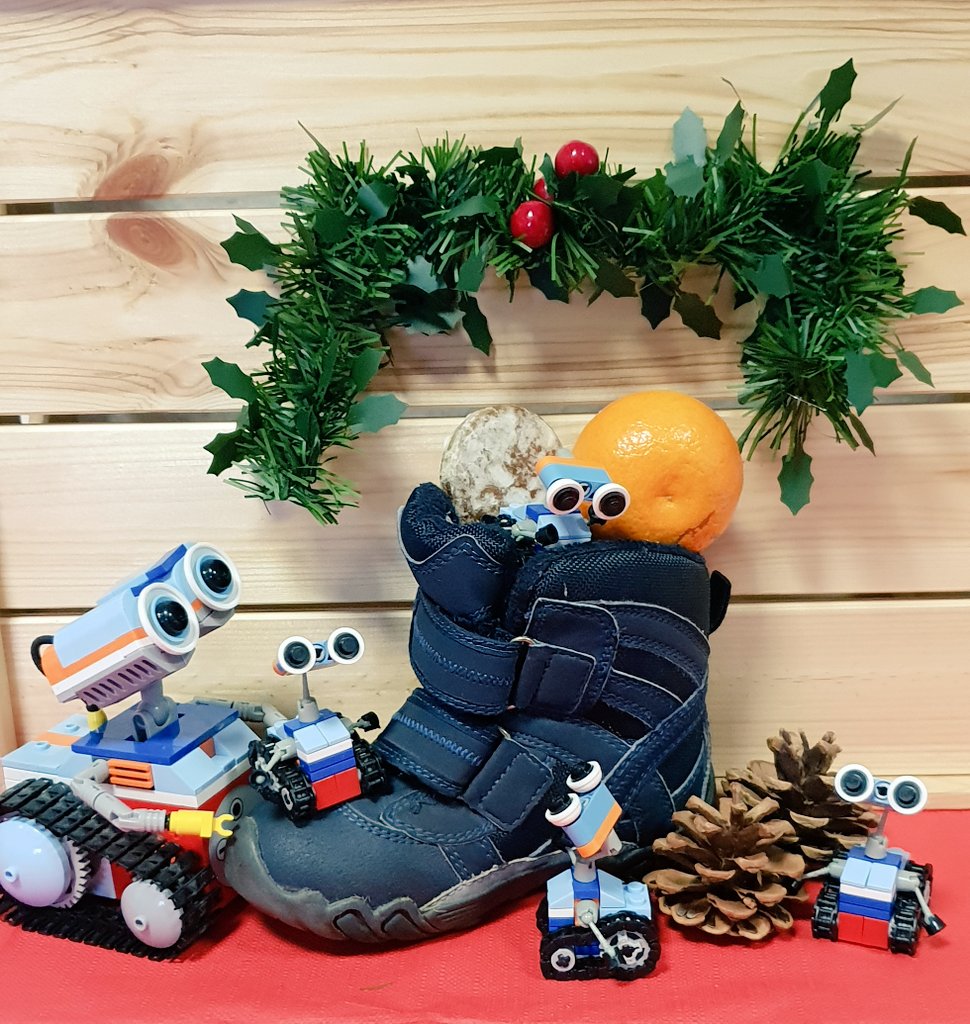 Habt einen schönen Nikolaustag! Was war bei euch heute im Stiefel? Happy St.Nicholas Day! In Germany the kids have to clean up their shoes yesterday and St.Nicholas put sweets, little presents &amp; mandarines into it. #Nikolaustag #robotics #codingforkids #tinkerbots #myfirstrobot