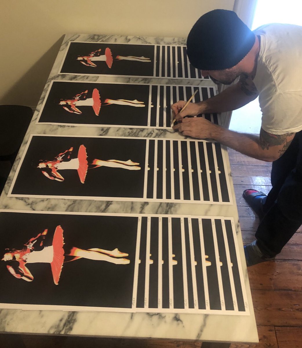 Signing new prints which will be available from my website tomorrow morning . 
solusstreetart.com/Shop