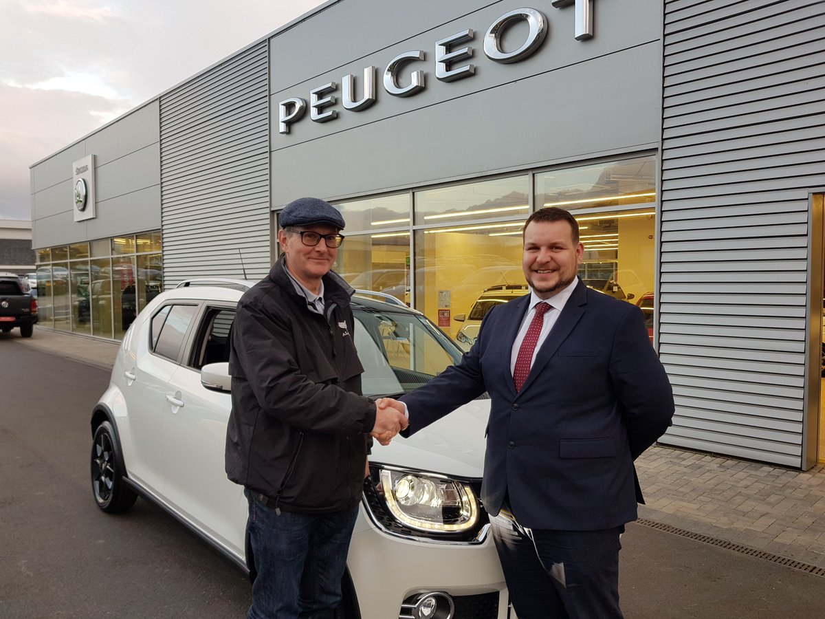 Here is customer Mr Saunders collecting his lovely new Suzuki Ignis hybrid Allgrip from Sales Executive Allan Campbell. 

We wish him many happy miles in his new car. #Happyhandover