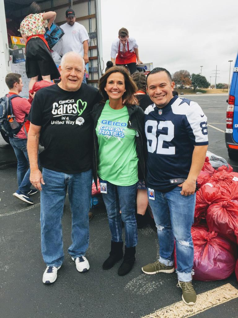 GEICO associates pose at the drop-off site. 