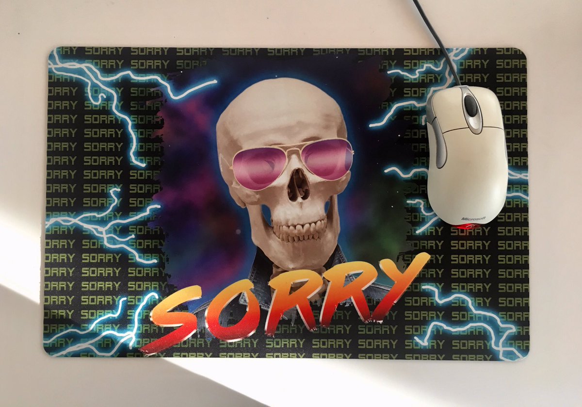 Da Share Z0ne Mouse Pad with skull wearing sunglasses saying “SORRY” surrounded by lightning