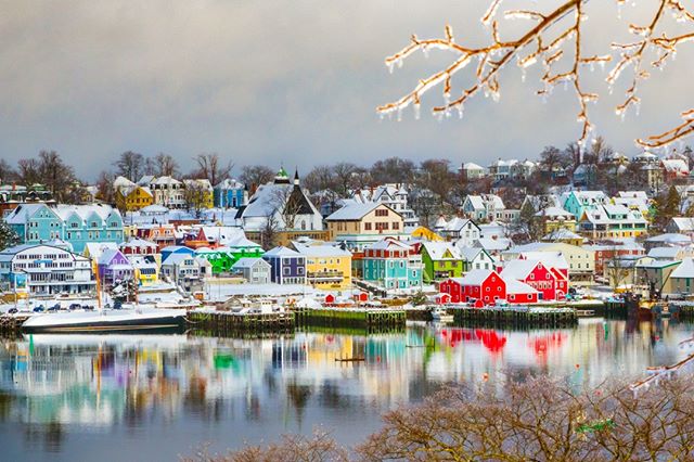 VisitNovaScotia's tweet photo. #TBT UNESCO Town of Lunenburg with a light dusting of snow. Pretty enough to be a on a Christmas card. || Featured Photo by @acorn_art_photography  #VisitNovaScotia #ExploreCanada https://t.co/CeLnq8bvTc