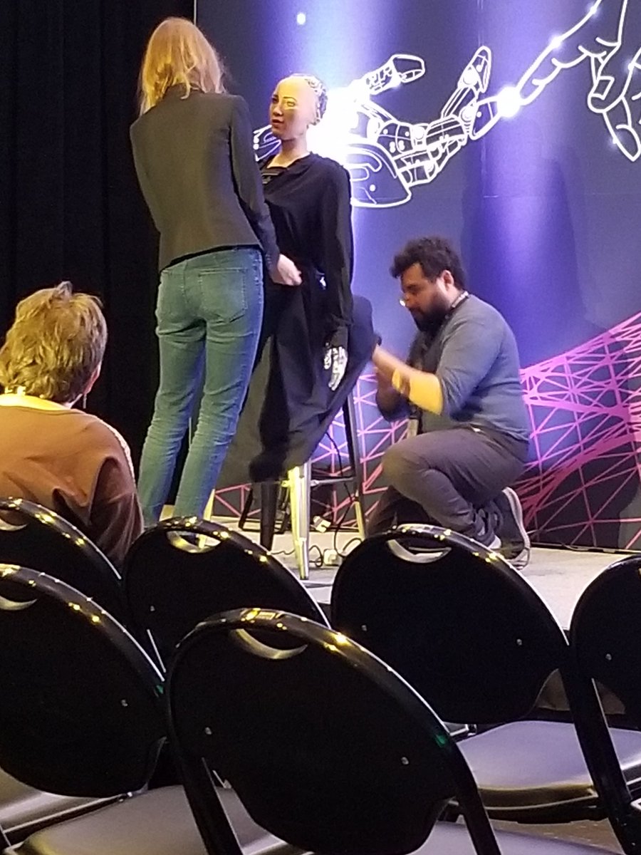 Industrialpoet's tweet photo. Sophia the robot being prepped for her presentation in the next session. @DZone #AISummit https://t.co/plPBa3LRgD